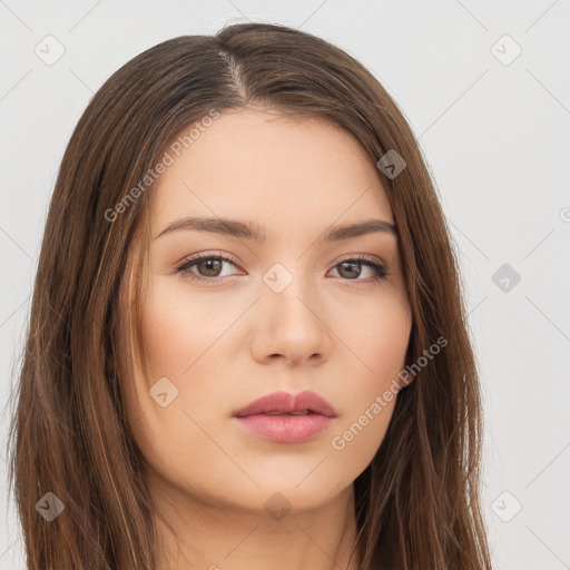 Neutral white young-adult female with long  brown hair and brown eyes