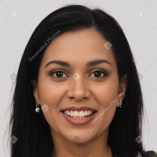 Joyful latino young-adult female with long  brown hair and brown eyes