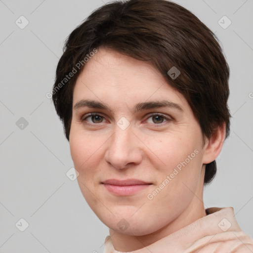 Joyful white young-adult female with short  brown hair and brown eyes