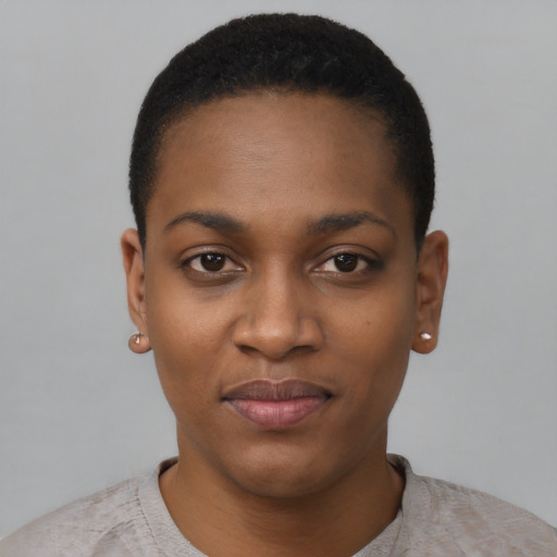 Joyful black young-adult female with short  black hair and brown eyes