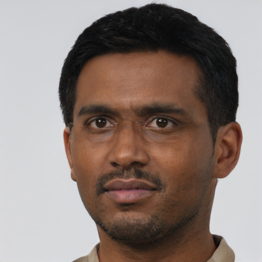Neutral black adult male with short  black hair and brown eyes