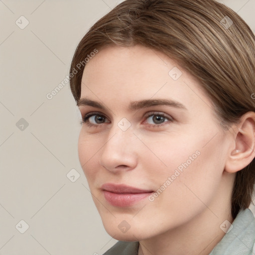 Neutral white young-adult female with medium  brown hair and grey eyes