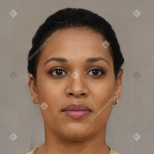 Joyful black young-adult female with short  brown hair and brown eyes