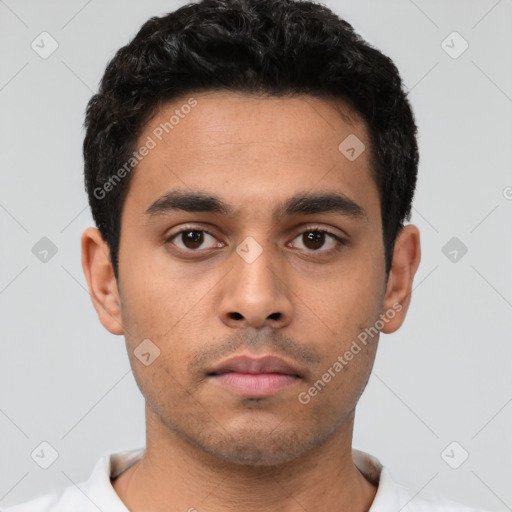 Neutral latino young-adult male with short  black hair and brown eyes