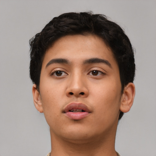 Neutral asian young-adult male with short  black hair and brown eyes
