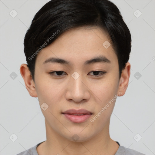 Joyful asian young-adult female with short  black hair and brown eyes