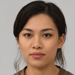 Neutral asian young-adult female with medium  brown hair and brown eyes