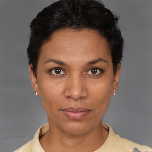 Neutral latino young-adult female with short  brown hair and brown eyes