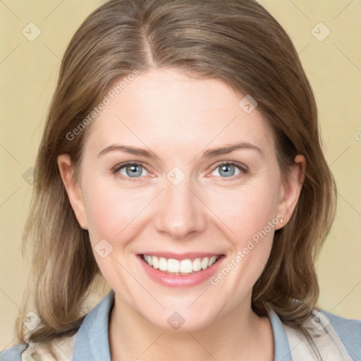 Joyful white young-adult female with medium  brown hair and blue eyes