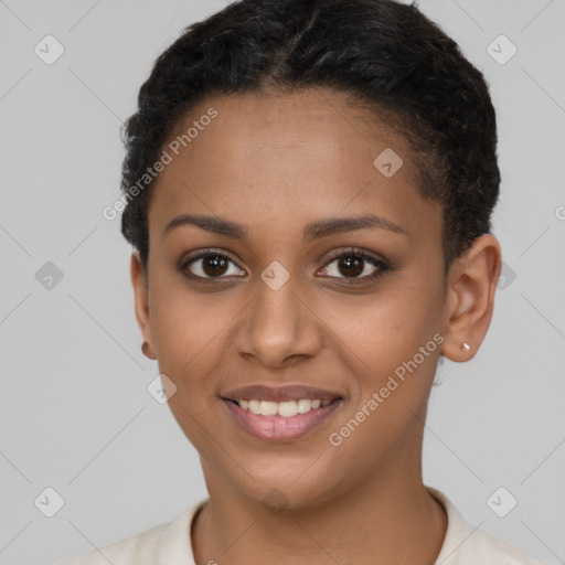 Joyful latino young-adult female with short  brown hair and brown eyes