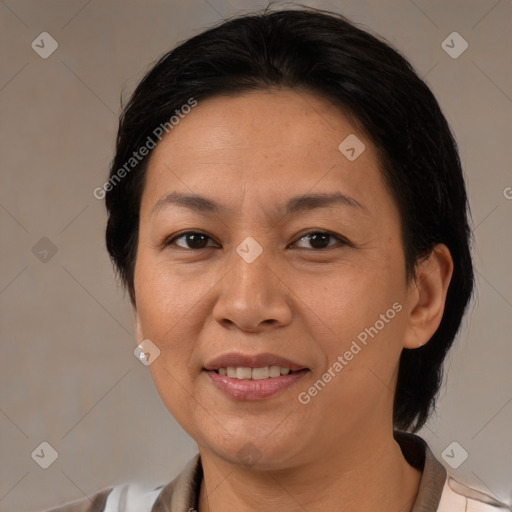 Joyful white adult female with medium  brown hair and brown eyes