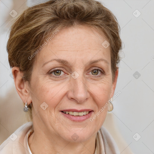 Joyful white adult female with short  brown hair and grey eyes