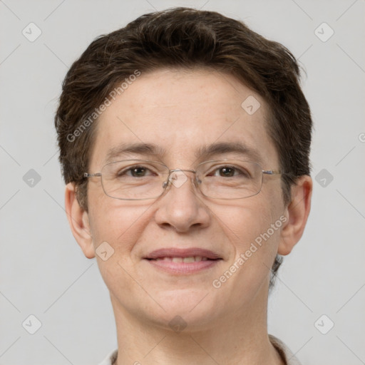 Joyful white adult male with short  brown hair and grey eyes