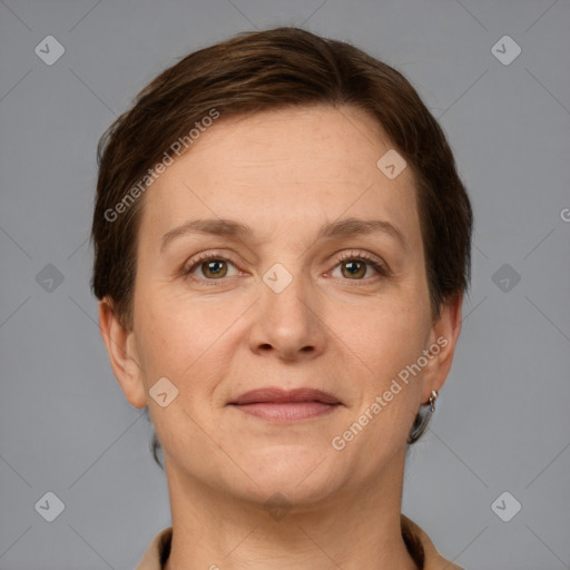 Joyful white adult female with short  brown hair and grey eyes