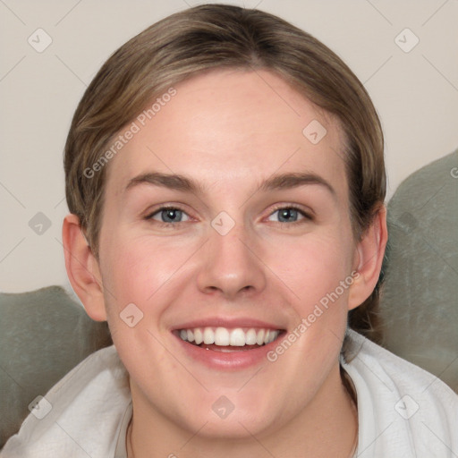 Joyful white young-adult female with medium  brown hair and blue eyes