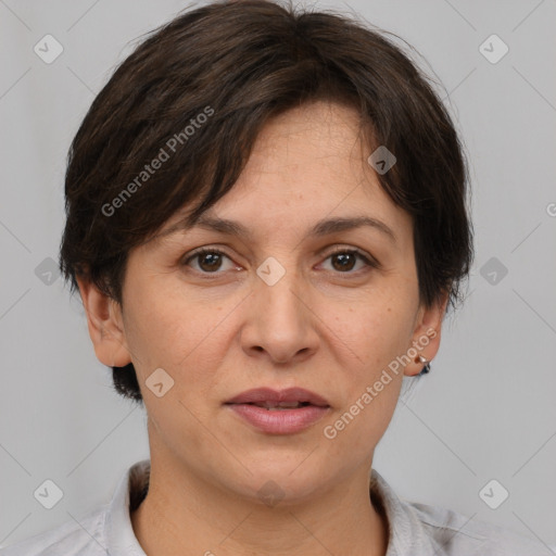 Joyful white adult female with short  brown hair and brown eyes