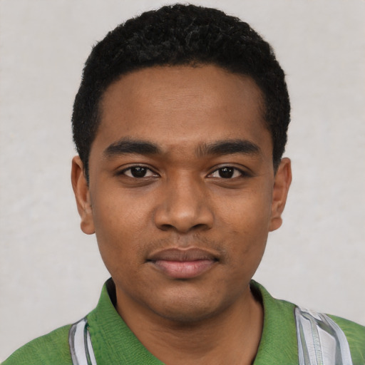 Neutral black young-adult male with short  black hair and brown eyes