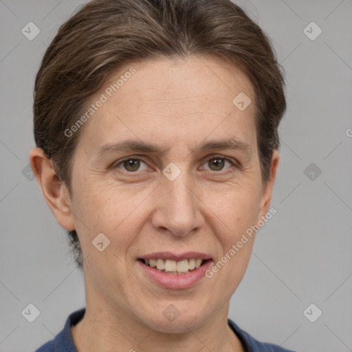 Joyful white adult female with short  brown hair and brown eyes