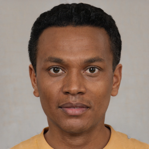 Neutral black young-adult male with short  black hair and brown eyes