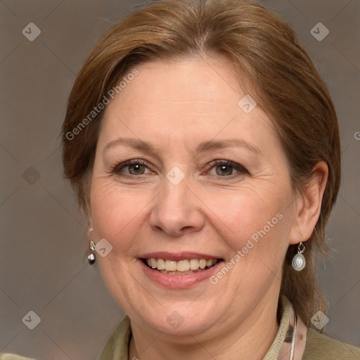 Joyful white adult female with medium  brown hair and grey eyes