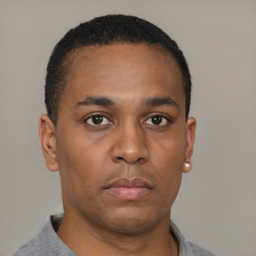 Neutral black young-adult male with short  brown hair and brown eyes