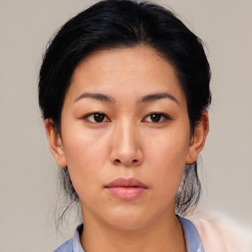 Neutral asian young-adult female with medium  black hair and brown eyes