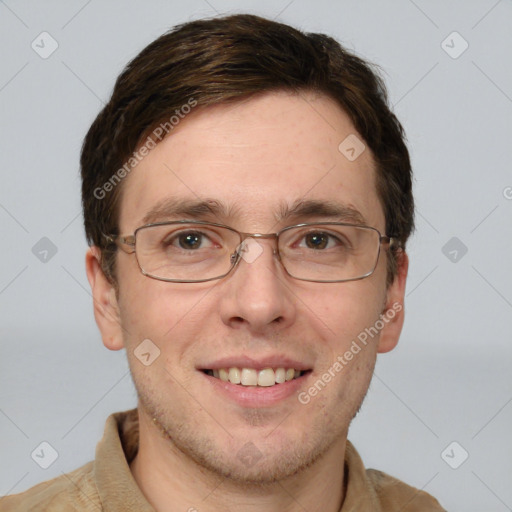 Joyful white adult male with short  brown hair and grey eyes