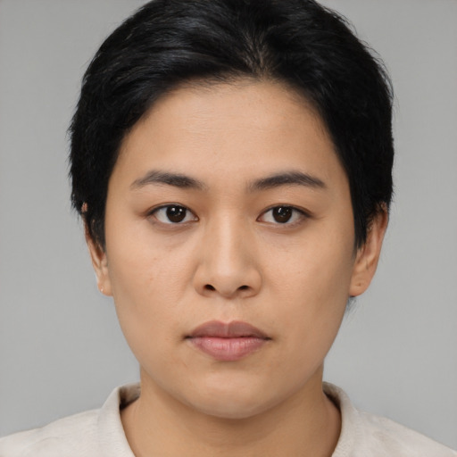 Neutral asian young-adult female with short  black hair and brown eyes