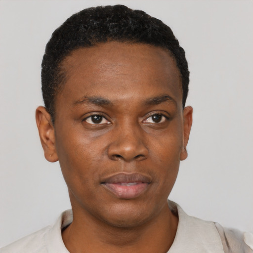 Neutral black young-adult male with short  black hair and brown eyes