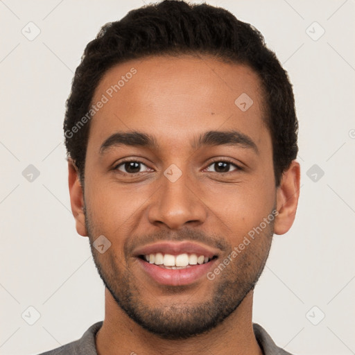 Joyful latino young-adult male with short  brown hair and brown eyes