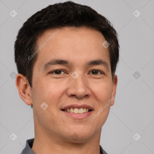 Joyful white young-adult male with short  black hair and brown eyes