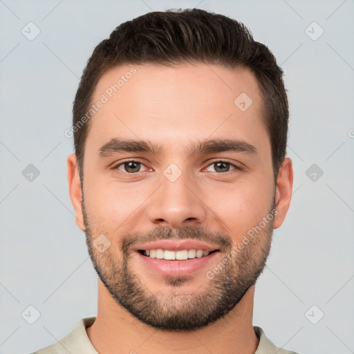 Joyful white young-adult male with short  brown hair and brown eyes