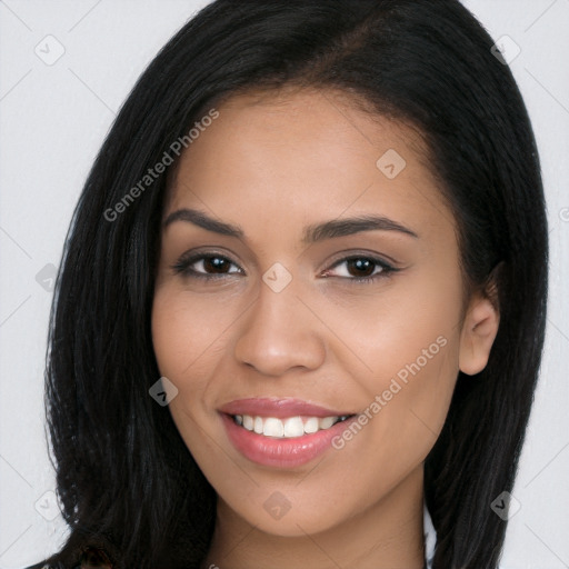 Joyful latino young-adult female with long  brown hair and brown eyes