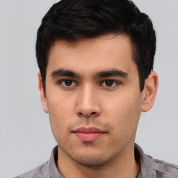 Neutral asian young-adult male with short  brown hair and brown eyes