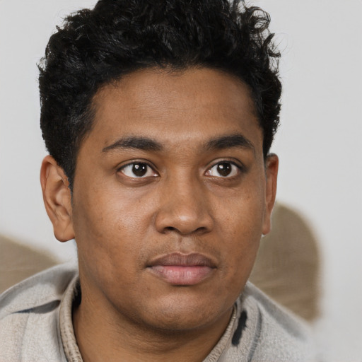 Neutral black young-adult male with short  brown hair and brown eyes