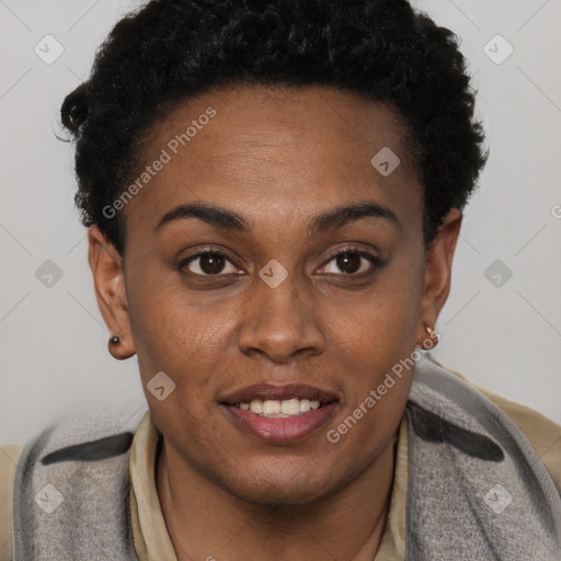 Joyful black young-adult female with short  brown hair and brown eyes