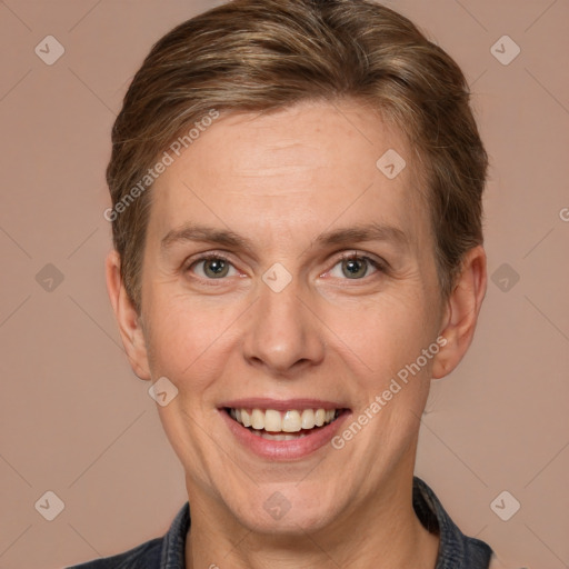 Joyful white adult female with short  brown hair and brown eyes