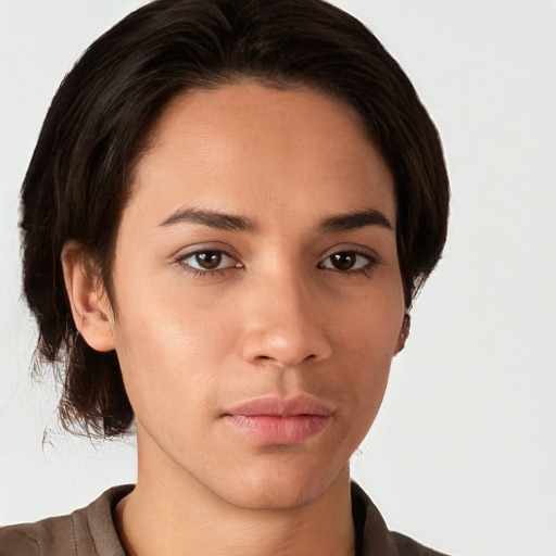 Neutral white young-adult female with short  brown hair and brown eyes