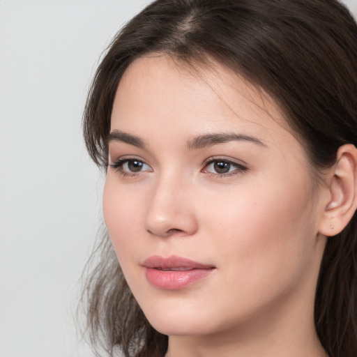 Neutral white young-adult female with medium  brown hair and brown eyes