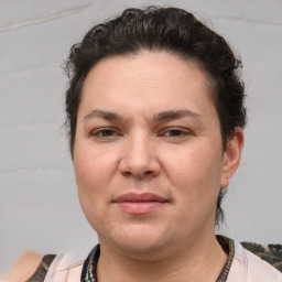 Joyful white adult female with short  brown hair and brown eyes