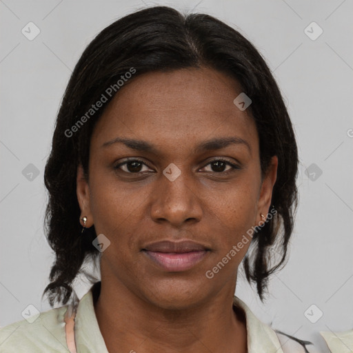 Joyful black young-adult female with medium  brown hair and brown eyes