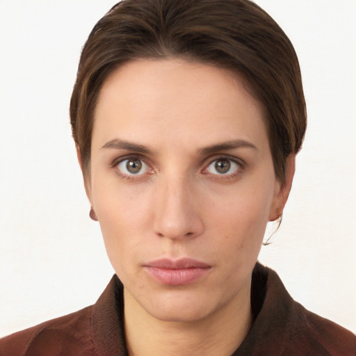 Neutral white young-adult female with short  brown hair and brown eyes