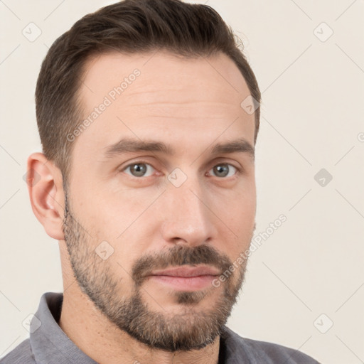 Neutral white young-adult male with short  brown hair and brown eyes