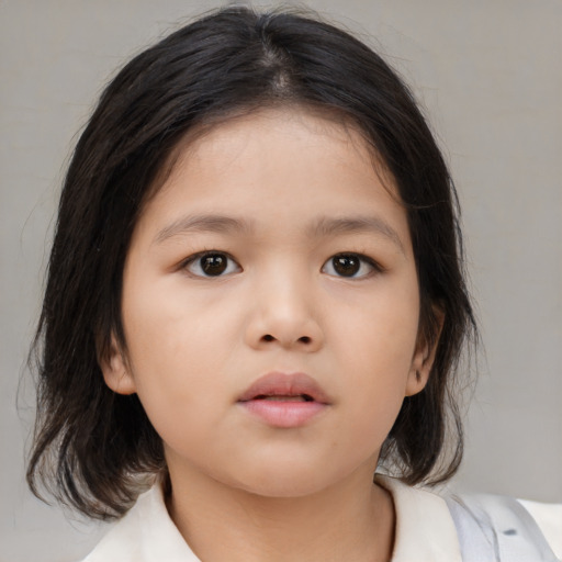 Neutral asian child female with medium  brown hair and brown eyes