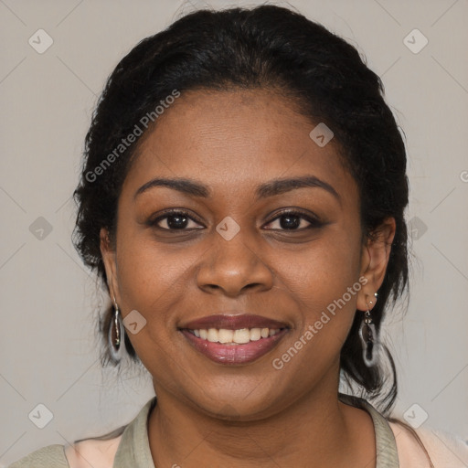 Joyful black young-adult female with medium  black hair and brown eyes