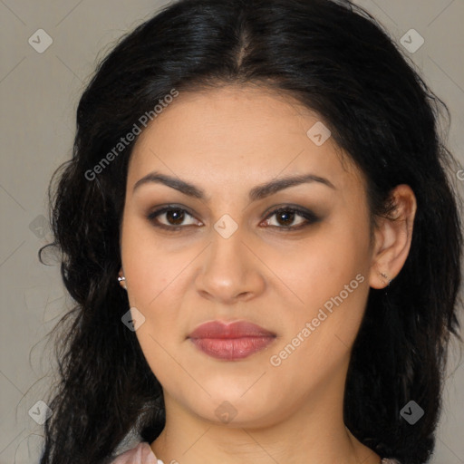 Joyful latino young-adult female with long  brown hair and brown eyes