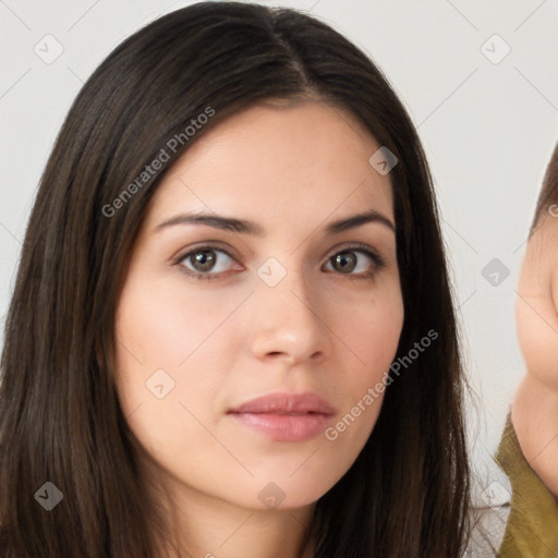 Neutral white young-adult female with long  brown hair and brown eyes