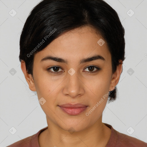 Joyful latino young-adult female with short  black hair and brown eyes