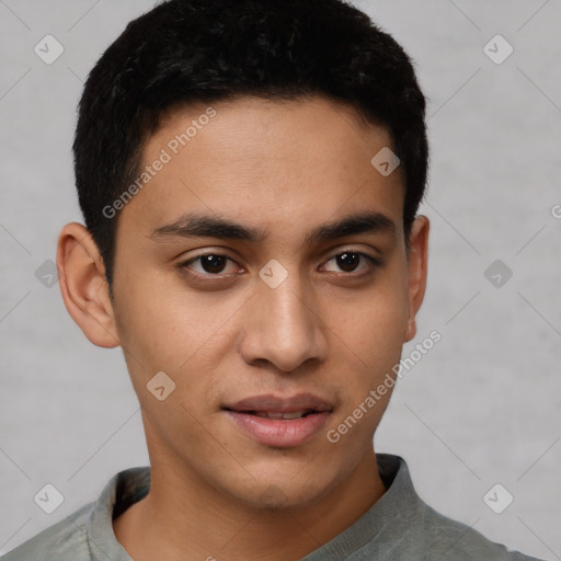 Joyful latino young-adult male with short  black hair and brown eyes