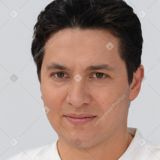 Joyful white adult male with short  brown hair and brown eyes